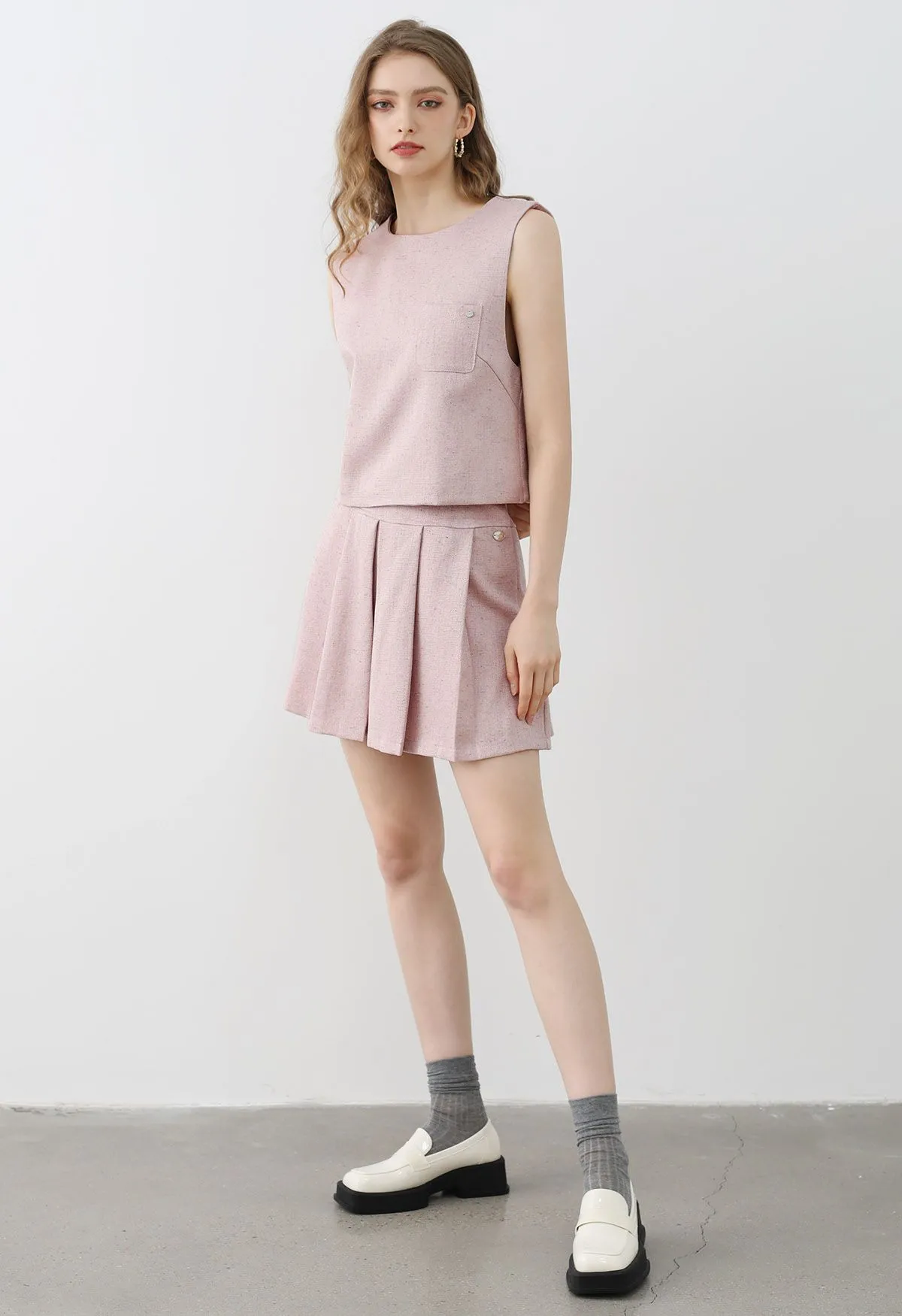 Ensemble chic sans manches en tweed et mini-jupe plissée en rose
