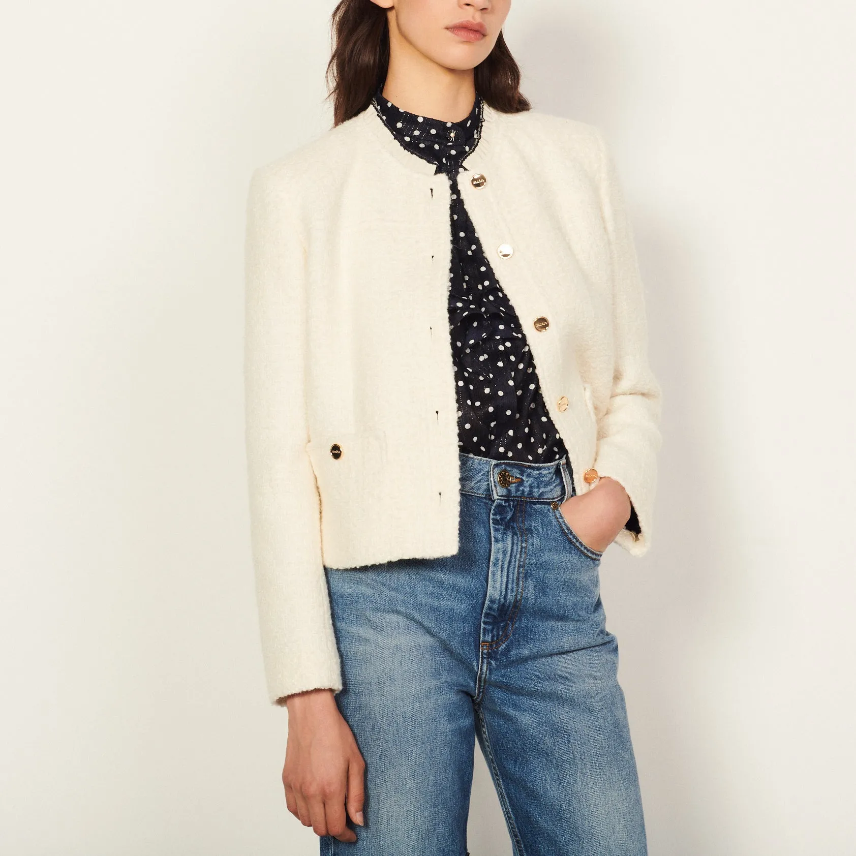 Veste avec galon au col